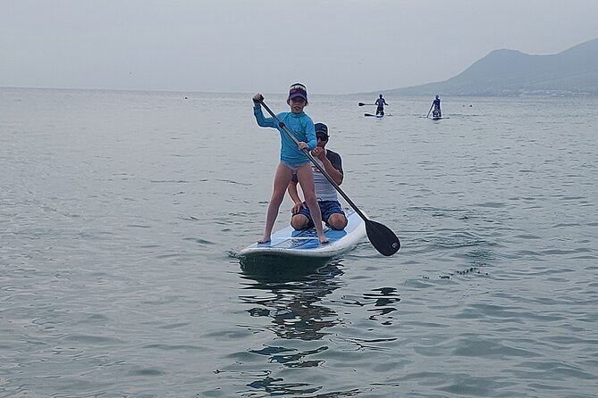 SUP Paddle Board Adventure - Snorkeling with help from the guide